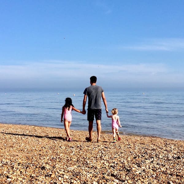 Walking on the beach with my two daughters